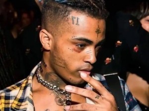 XXXtentacion 的含义：一位备受争议的美国说唱歌手，他的音乐风格独特，歌词富有情感和深度